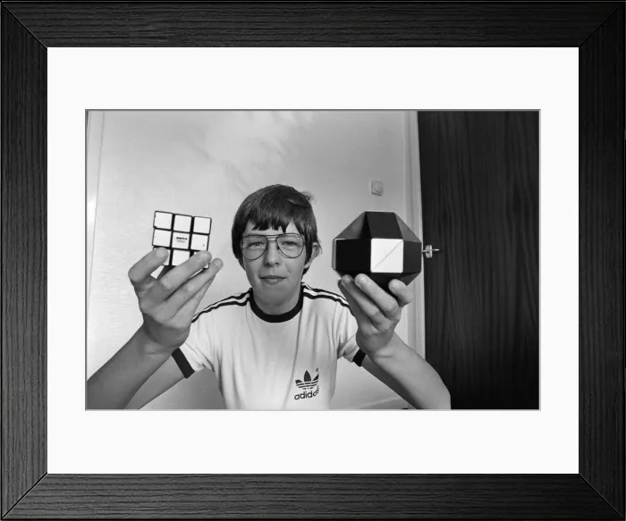 Framed Print : 14 year old Terence Wilson of Deepdale near Preston, with his Rubik cube and snake Framed Print : 14 year old Terence Wilson of Deepdale near Preston, with his Rubik cube and snake