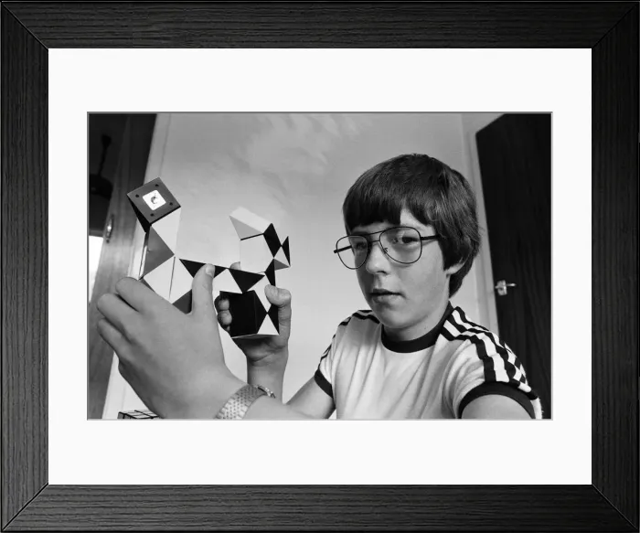 Framed Print : 14 year old Terence Wilson of Deepdale near Preston, with his Rubik snake Framed Print : 14 year old Terence Wilson of Deepdale near Preston, with his Rubik snake