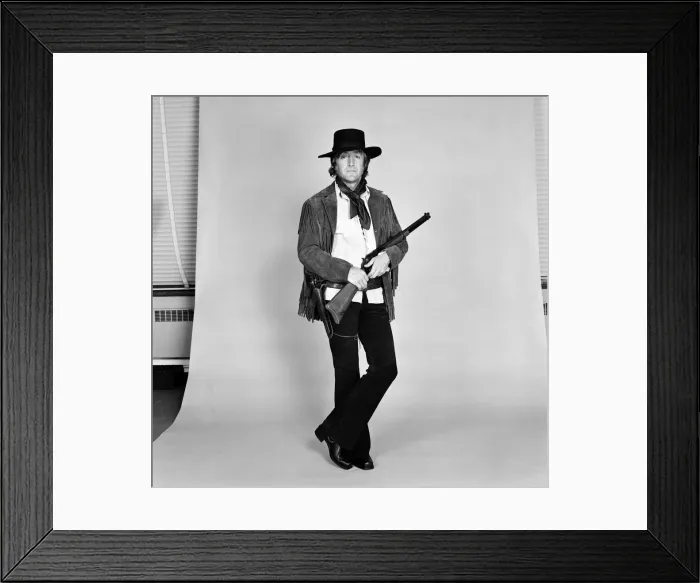 Framed Print : TV personality Michael Parkinson dressed in cowboy attire. 28th September 1972