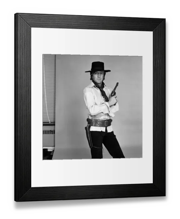 Framed Print : TV personality Michael Parkinson dressed in cowboy attire. 28th September 1972