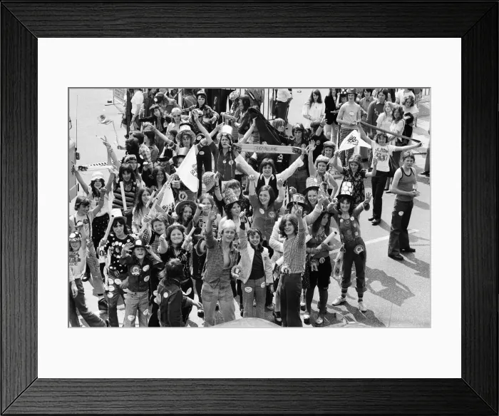 Framed Print : Fans of pop group Slade get ready for the invasion of Earls Court tonight where the group