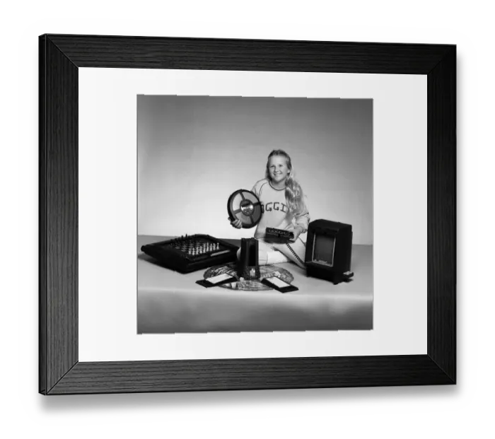 Framed Print : A young girl with a selection of childrens toys. 11th November 1983 Framed Print : A young girl with a selection of childrens toys. 11th November 1983