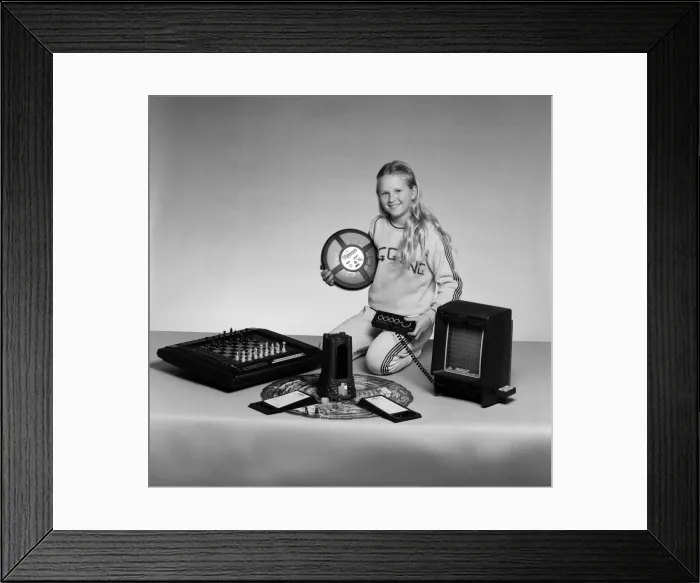 Framed Print : A young girl with a selection of childrens toys. 11th November 1983 Framed Print : A young girl with a selection of childrens toys. 11th November 1983