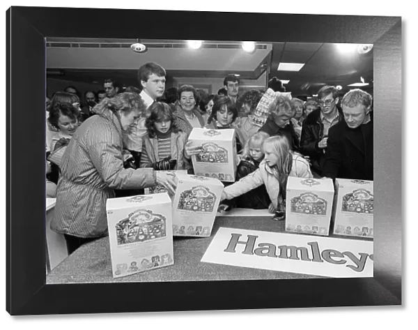 Shoppers buying Cabbage Patch Dolls at Hamleys, London toy store. 3rd December 1983