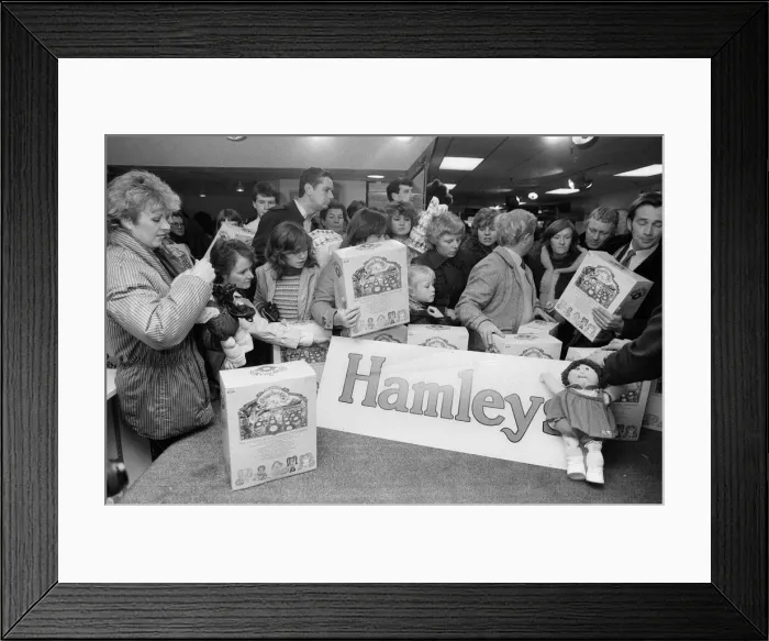 Framed Print : Shoppers buying Cabbage Patch Dolls at Hamleys, London toy store. 3rd December 1983 Framed Print : Shoppers buying Cabbage Patch Dolls at Hamleys, London toy store. 3rd December 1983