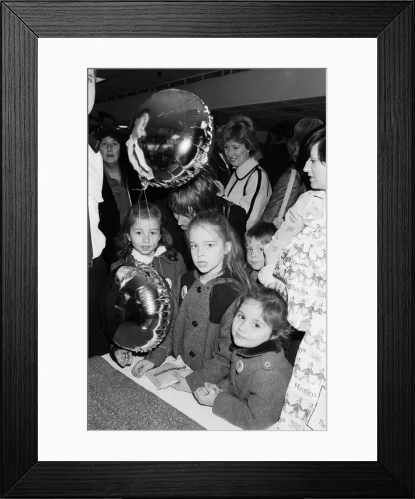 Framed Print : Shoppers at Hamleys, London toy store. 3rd December 1983 Framed Print : Shoppers at Hamleys, London toy store. 3rd December 1983