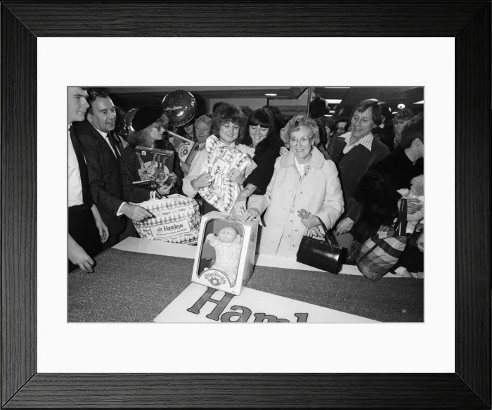 Framed Print : Shoppers buying Cabbage Patch Dolls at Hamleys, London toy store. 3rd December 1983 Framed Print : Shoppers buying Cabbage Patch Dolls at Hamleys, London toy store. 3rd December 1983