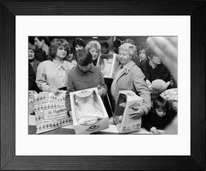Framed Print : Shoppers buying Cabbage Patch Dolls at Hamleys, London toy store. 3rd December 1983 Framed Print : Shoppers buying Cabbage Patch Dolls at Hamleys, London toy store. 3rd December 1983