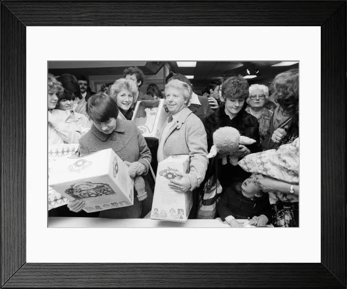 Framed Print : Shoppers buying Cabbage Patch Dolls at Hamleys, London toy store. 3rd December 1983 Framed Print : Shoppers buying Cabbage Patch Dolls at Hamleys, London toy store. 3rd December 1983