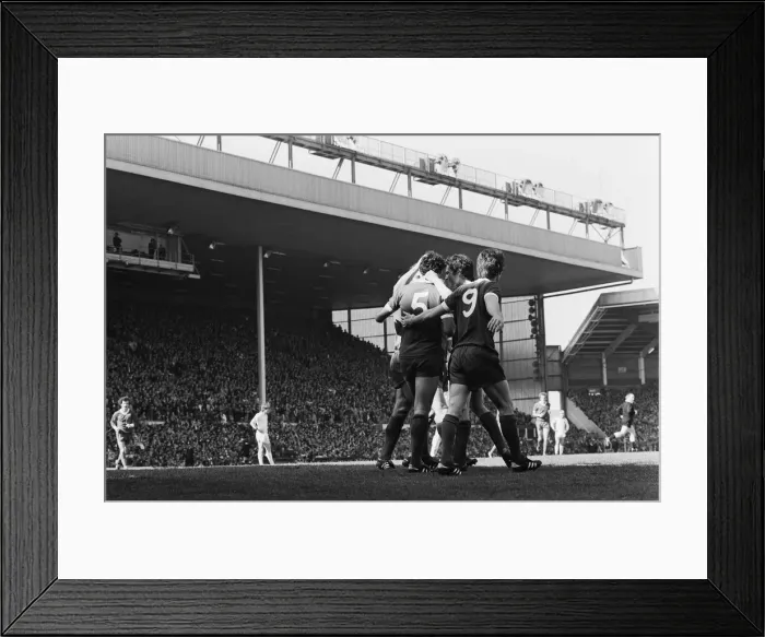 Framed Print : Liverpool Football team celebrate winning the League title after defeating Aston Villa