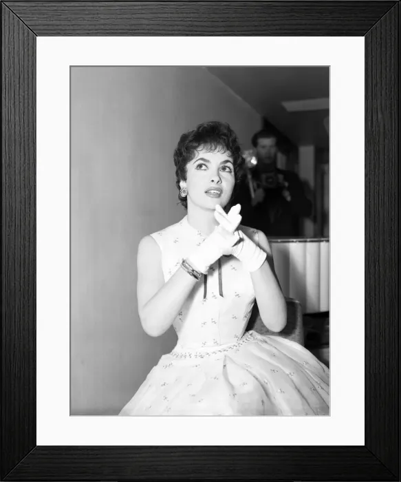 Framed Print : Gina Lollobrigida, Italian actress, attends press reception for new film, Trapeze