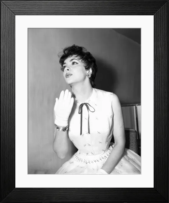 Framed Print : Gina Lollobrigida, Italian actress, attends press reception for new film, Trapeze