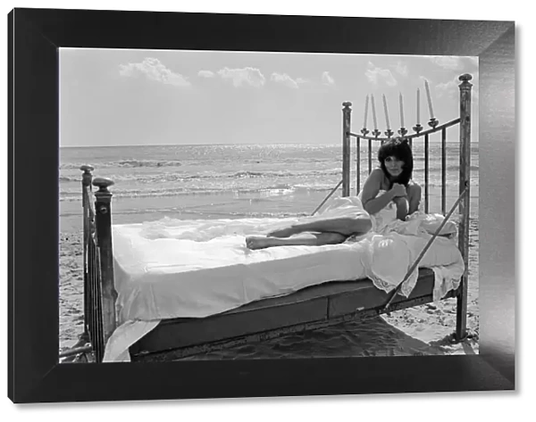 Joan Collins pictured on the set of her new film. Pictured on Camber Sands, Rye