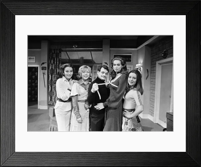 Framed Print : Vital statistical work by David Jason as inch by inch he gets the measure of Valerie Leon Framed Print : Vital statistical work by David Jason as inch by inch he gets the measure of Valerie Leon