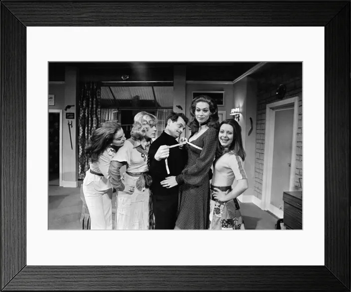 Framed Print : Vital statistical work by David Jason as inch by inch he gets the measure of Valerie Leon Framed Print : Vital statistical work by David Jason as inch by inch he gets the measure of Valerie Leon