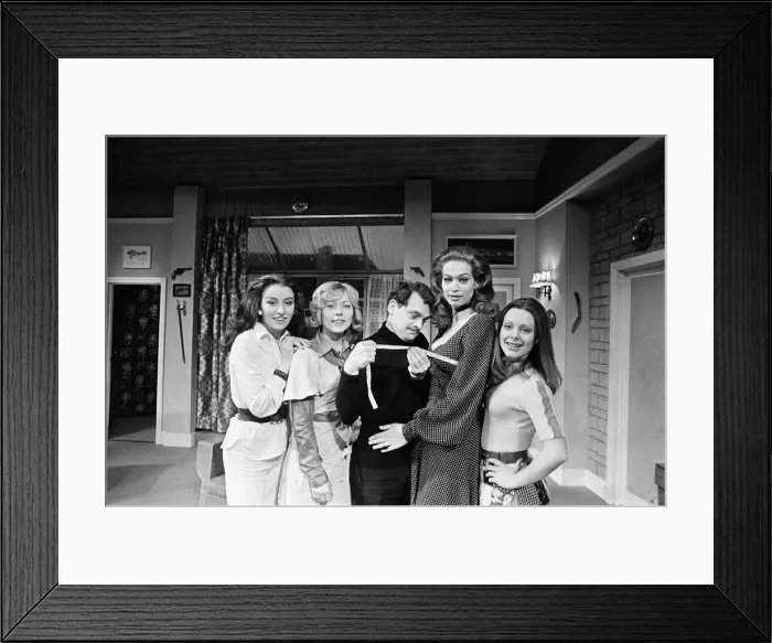Framed Print : Vital statistical work by David Jason as inch by inch he gets the measure of Valerie Leon Framed Print : Vital statistical work by David Jason as inch by inch he gets the measure of Valerie Leon