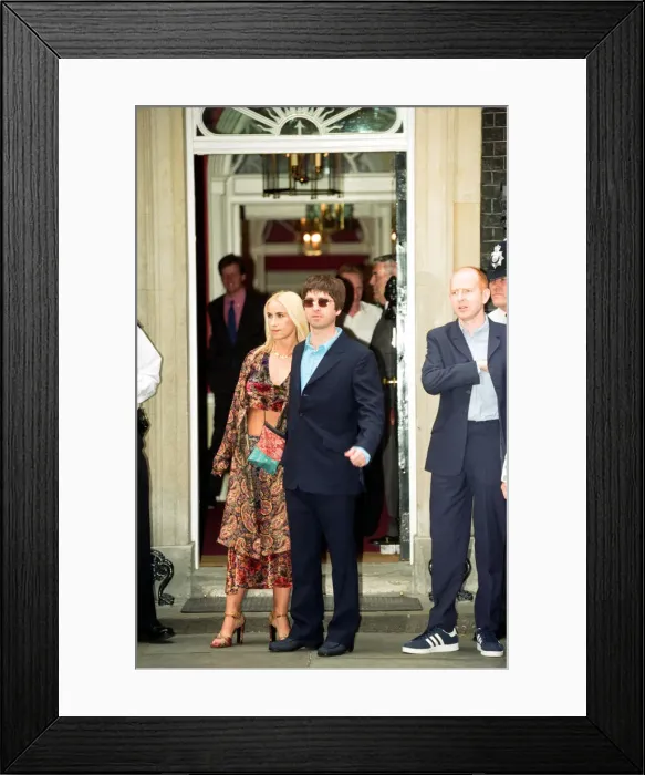 Framed Print : Noel Gallagher and his girlfriend Meg Matthews at 10 Downing Street for a party held by