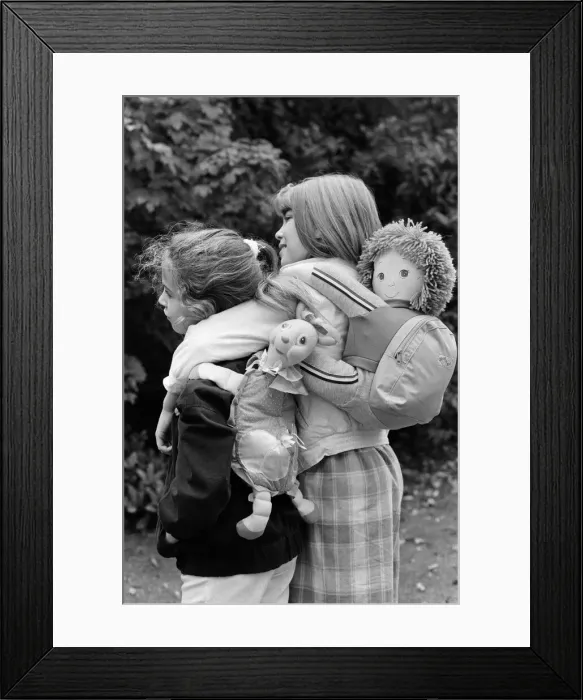 Framed Print : Two young girls wearing soft toy rucksacks. 21st October 1986 Framed Print : Two young girls wearing soft toy rucksacks. 21st October 1986
