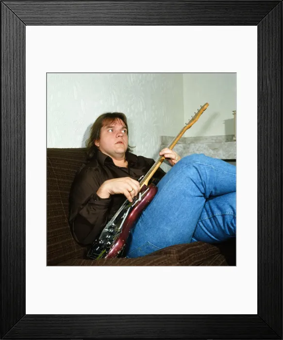 Framed Print : Musician Meat Loaf playing his guitar. September 1983 Framed Print : Musician Meat Loaf playing his guitar. September 1983