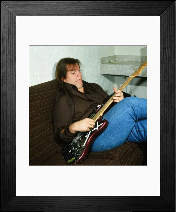 Framed Print : Musician Meat Loaf playing his guitar. September 1983 Framed Print : Musician Meat Loaf playing his guitar. September 1983