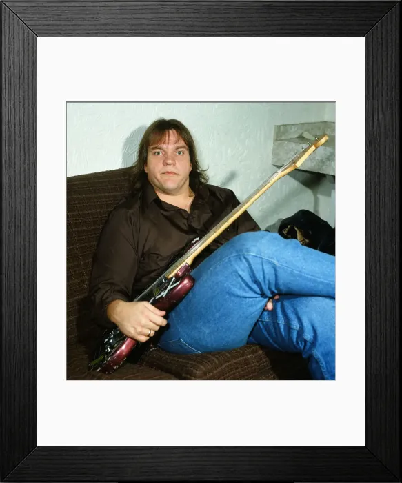 Framed Print : Musician Meat Loaf playing his guitar. September 1983 Framed Print : Musician Meat Loaf playing his guitar. September 1983