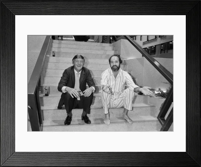 Framed Print : Michael Parkinson and John Cleese at the TV-am studios. 1983 Framed Print : Michael Parkinson and John Cleese at the TV-am studios. 1983