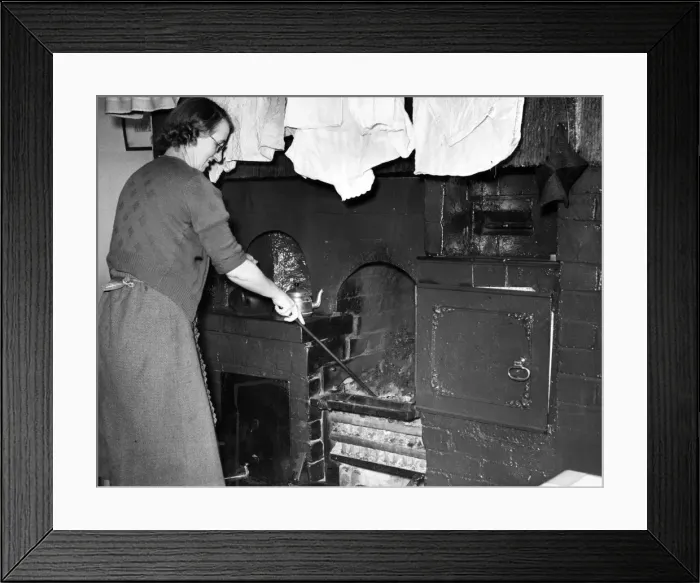 Framed Print : Its all a matter of saving fuel although miners wives seeing the new-style ranges to