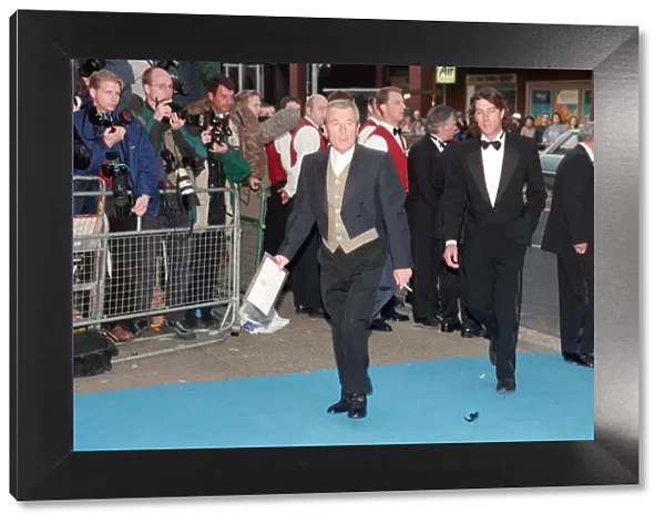 Photographer Terry O Neill arriving at Elton John