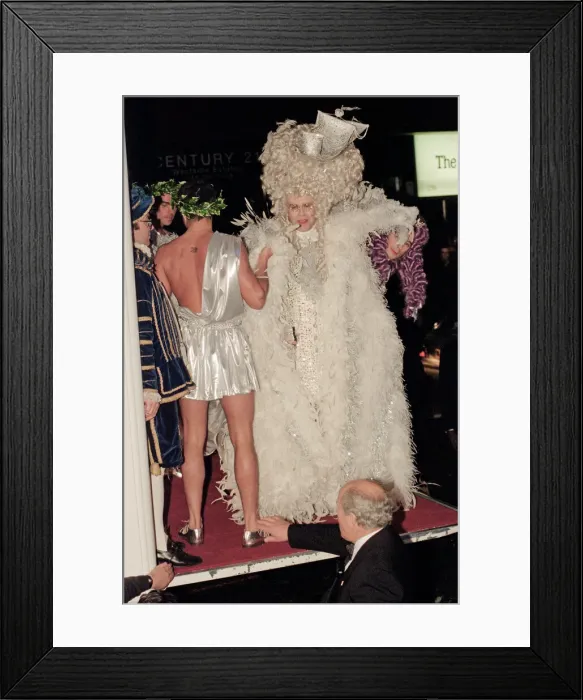 Framed Print : Elton John arriving at his 50th birthday party at Hammersmith Palais. 6th April 1997 Framed Print : Elton John arriving at his 50th birthday party at Hammersmith Palais. 6th April 1997