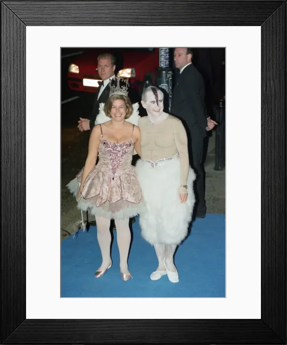 Framed Print : John Reid (Elton Johns Manager), and guest arriving at Elton John Framed Print : John Reid (Elton Johns Manager), and guest arriving at Elton John