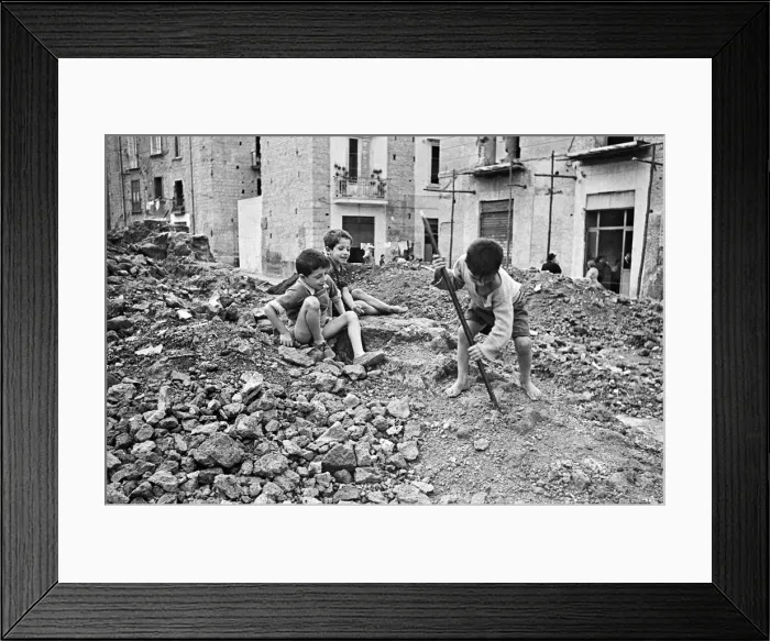 Framed Print : Scenes in Naples, southern Italy showing local children playing games in the street Framed Print : Scenes in Naples, southern Italy showing local children playing games in the street