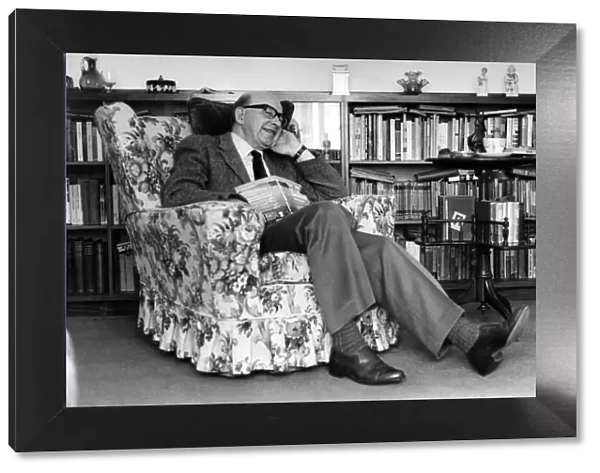 Writer Sid Chaplin, pictured sitting in a chair. Circa 1983