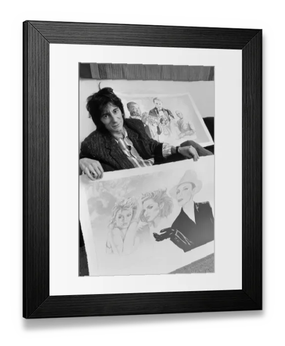 Framed Print : Ronnie Wood, pictured in 1987 with his drawings. These drawings would