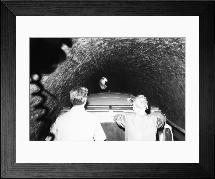 Framed Print : A small pleasure craft seen here passing through the Chirk Tunnel on the Llangollen Canal Framed Print : A small pleasure craft seen here passing through the Chirk Tunnel on the Llangollen Canal