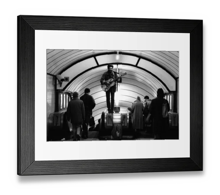 Framed Print : A musician busking at Oxford Circus Station - February 1987 standing Framed Print : A musician busking at Oxford Circus Station - February 1987 standing