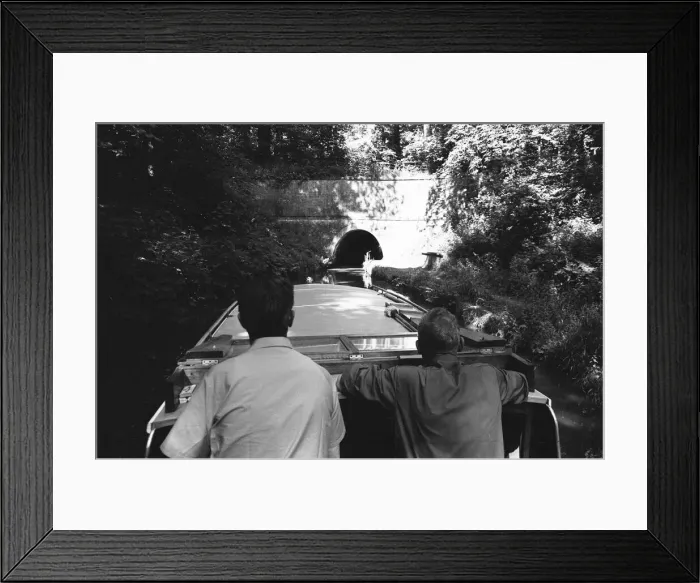 Framed Print : A small pleasure craft seen here passing approaching the Chirk Tunnel on the Llangollen