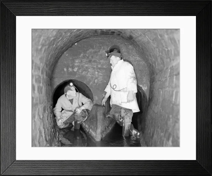 Framed Print : Two of the men who know the secrets of the dark world that lies under the busy streets of Framed Print : Two of the men who know the secrets of the dark world that lies under the busy streets of