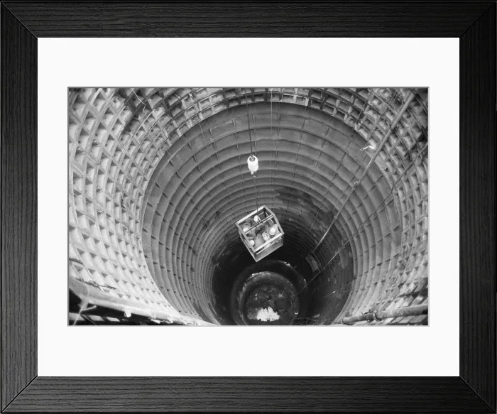 Framed Print : Channel Tunnel Construction 28th November 1987. Workers being lowered down into Framed Print : Channel Tunnel Construction 28th November 1987. Workers being lowered down into
