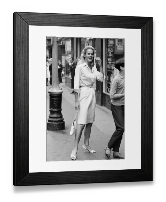 Framed Print : Ursula Andress, Swiss actress, pictured outside the offices of Gala Films Limited, London Framed Print : Ursula Andress, Swiss actress, pictured outside the offices of Gala Films Limited, London