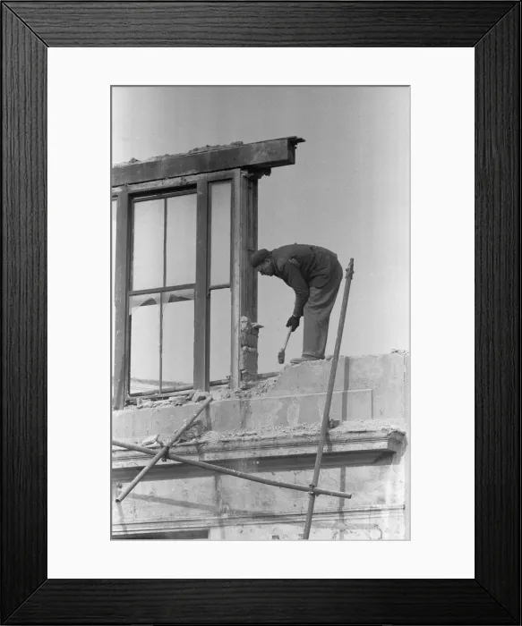 Framed Print : Clearing bomb damage buildings in Bromley by Bow. 3rd March 1955 Framed Print : Clearing bomb damage buildings in Bromley by Bow. 3rd March 1955