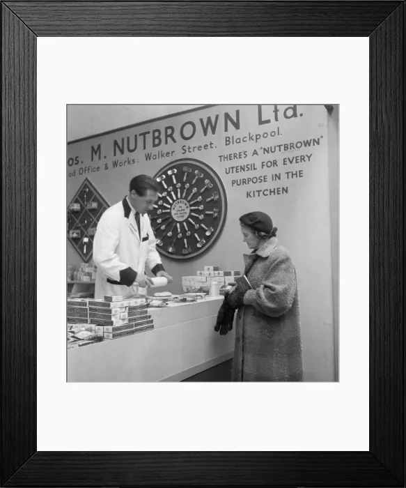 Framed Print : Ideal Home Exhibition Olympia. 3rd March 1955 Salesman from Thos M Nutbrown Limited Framed Print : Ideal Home Exhibition Olympia. 3rd March 1955 Salesman from Thos M Nutbrown Limited