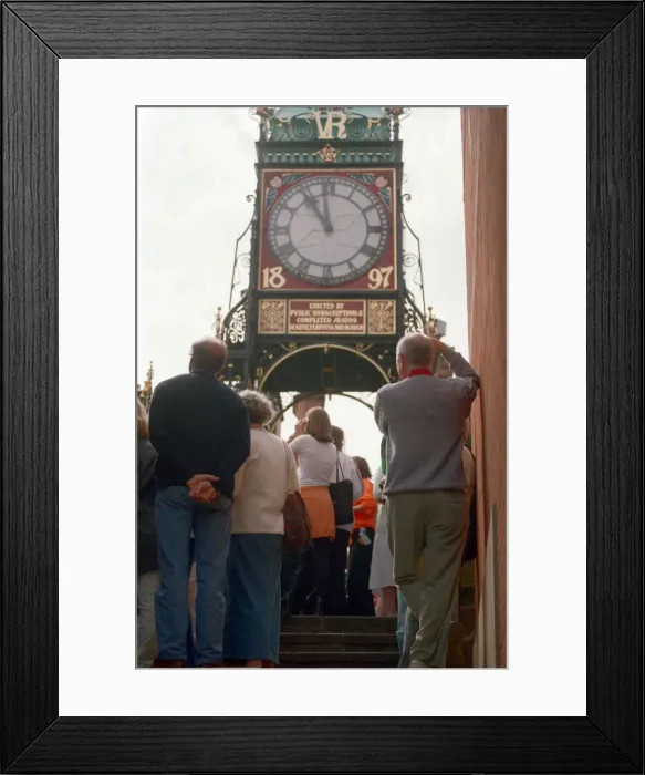 Framed Print : People watching the solar eclipse at the Eastgate and Eastgate Clock in Chester