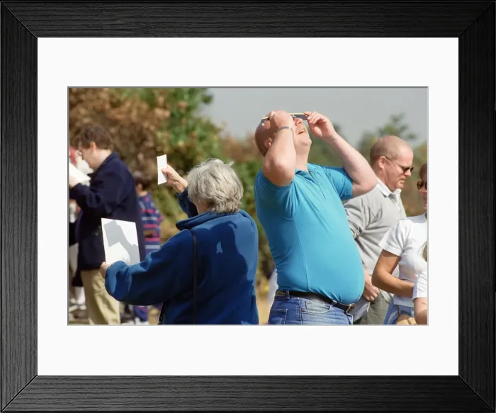 Framed Print : People watching the solar eclipse at Bidston Hill. 11th August 1999