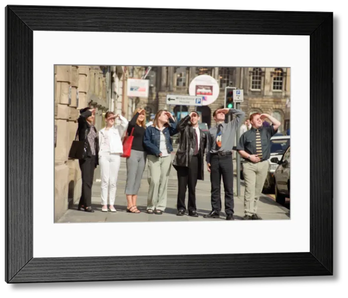 Framed Print : People in Liverpool city centre watching the solar eclipse. 11th August 1999 Framed Print : People in Liverpool city centre watching the solar eclipse. 11th August 1999