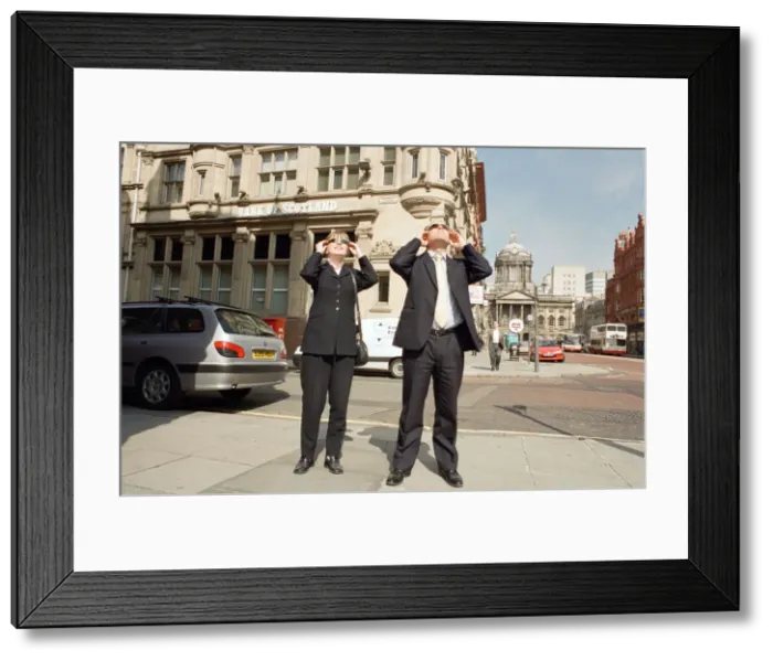 Framed Print : People in Liverpool city centre watching the solar eclipse. 11th August 1999 Framed Print : People in Liverpool city centre watching the solar eclipse. 11th August 1999