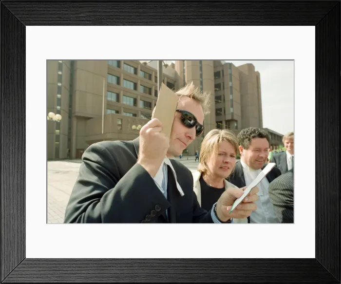 Framed Print : People in Liverpool city centre watching the solar eclipse Framed Print : People in Liverpool city centre watching the solar eclipse