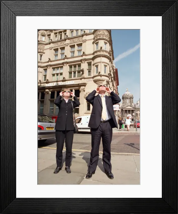 Framed Print : People in Liverpool city centre watching the solar eclipse. 11th August 1999 Framed Print : People in Liverpool city centre watching the solar eclipse. 11th August 1999
