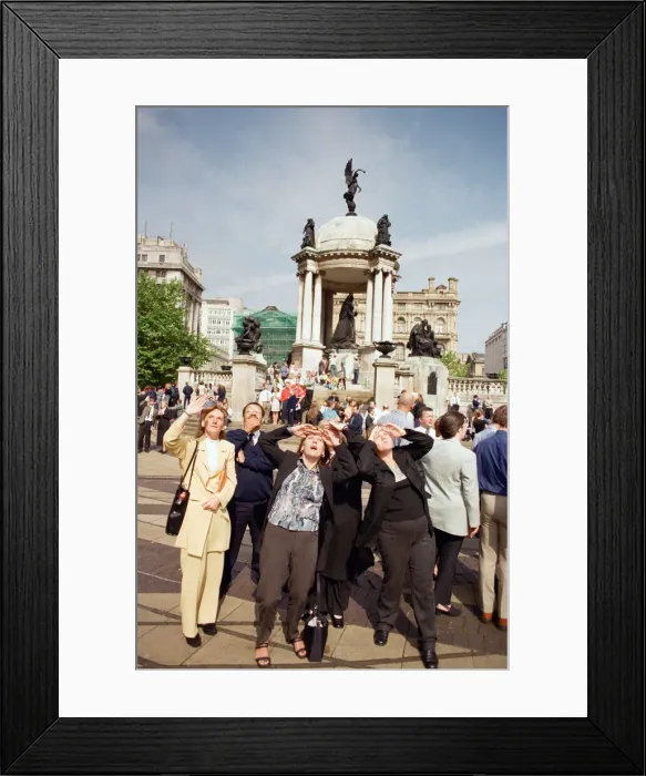 Framed Print : Crowds in Liverpool city centre watching the solar eclipse. 11th August 1999 Framed Print : Crowds in Liverpool city centre watching the solar eclipse. 11th August 1999