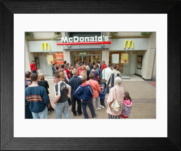 Framed Print : Cardiff, on the day of Princess Dianas funeral. Customers queuing outside Framed Print : Cardiff, on the day of Princess Dianas funeral. Customers queuing outside