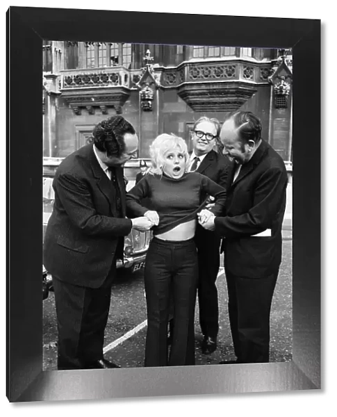 It was sweaters off for Barbara Windsor and members of Parliament outside the House of